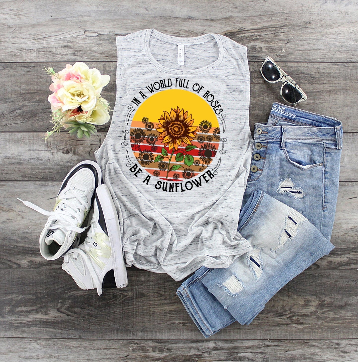 In A World Full Of Rose's Be A Sunflower Bella Canvas flowy tank.