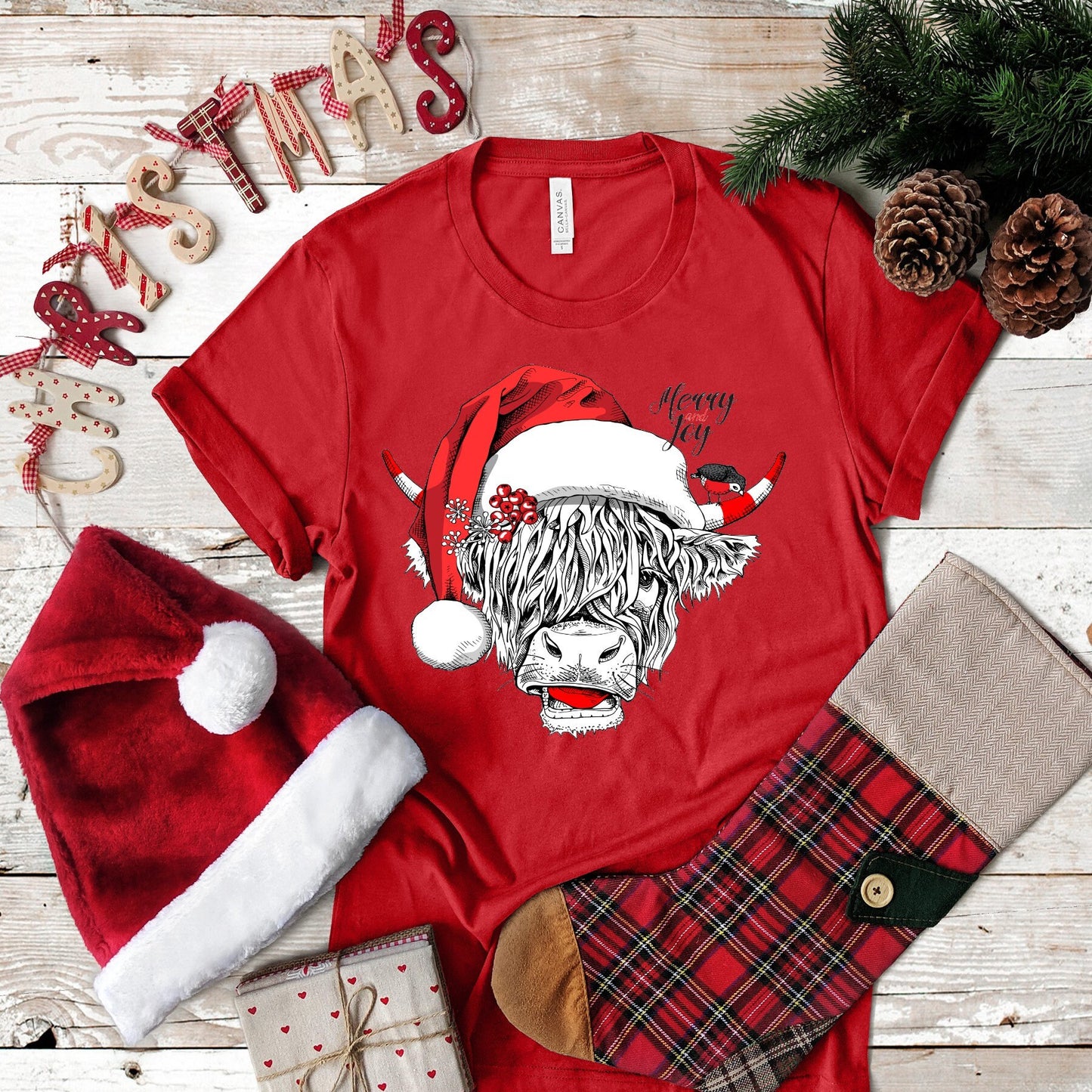 Christmas Long Haired Cow Highland Cow Santa Hat Merry and Joy .  design t-shirt