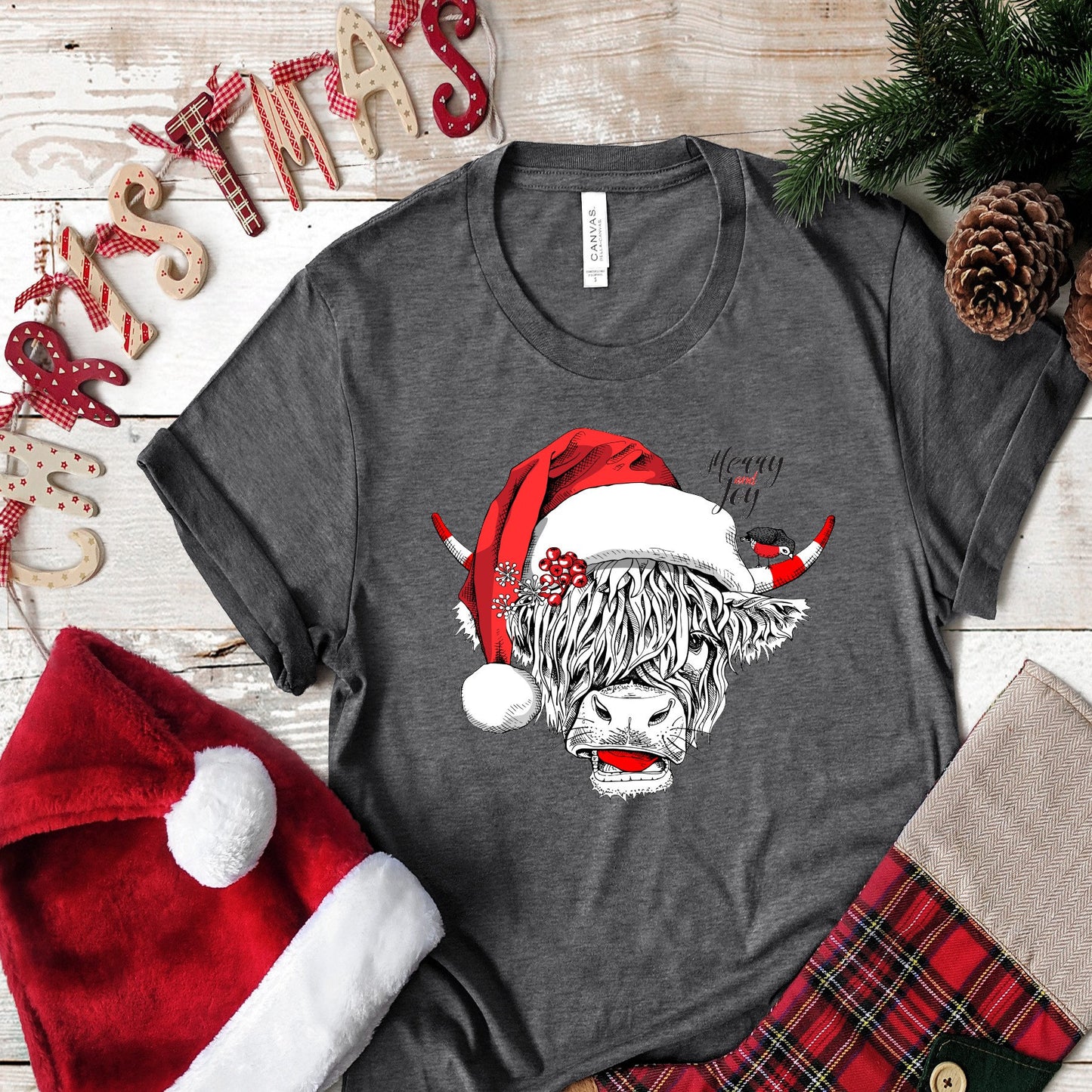 Christmas Long Haired Cow Highland Cow Santa Hat Merry and Joy .  design t-shirt